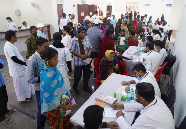 Free health camp with mobile medical unit serving a rural community